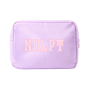 Soft pastel needlepoint XL project pouch featuring classic stitched lettering and zippered top.