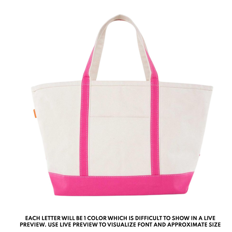 Canvas tote bag with vibrant pink handles and trim, personalized with embroidered teacher name