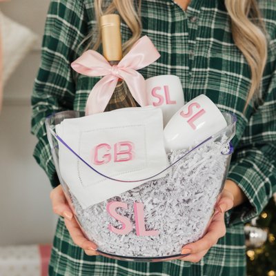 Holiday personalized tote bag filled with custom gifts, festive bundle.