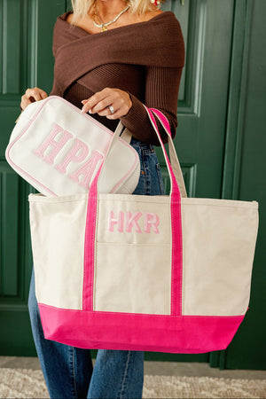 Woman holding two-tone personalized canvas tote with initials, everyday style.