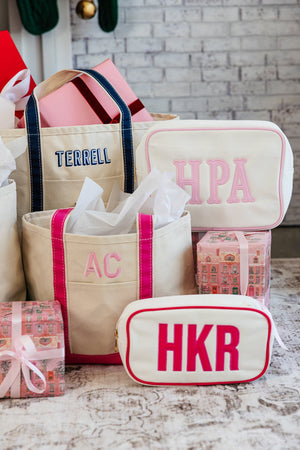 Personalized canvas tote bags with appliqué initials, perfect custom gifts for friends.