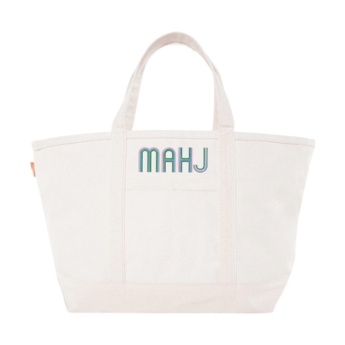 Cream canvas tote embroidered 'MAHJ' in a retro multicolor font, on a white background.