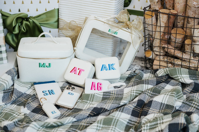 Clear leather toiletry case personalized with initials, perfect for travel or gifting