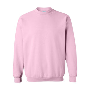 Custom embroidered collared t-shirt with stitched motif detail, shown in soft pink color.