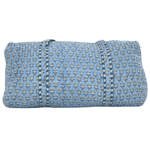 Light blue Embroidered Block Print Duffel with floral pattern, quilted fabric, and striped trim handles.