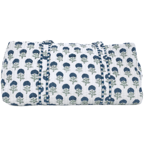 Close-up of white Embroidered Block Print Duffel bag with navy embroidered initials, tree pattern, and striped trim detail.