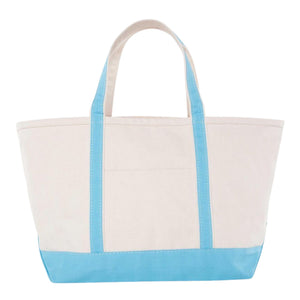 Natural canvas gameday tote with baby-blue trim and front pocket, customizable embroidery.