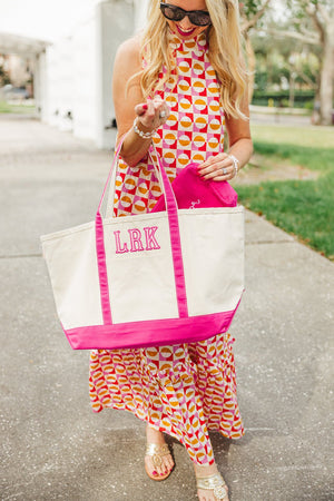 White embroidered tote bag with pink applique monogram, chic accessor