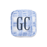 Personalized clear-coated jewelry case with light blue embroidered monogram, durable custom makeup, or travel bag.