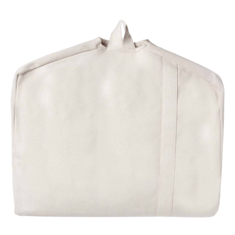 A Personalized Garment Duffel Bag in a chic cream shade from Sprinkled with Pink, designed for seamless travel and style. This convertible bag unfolds into a full garment bag, keeping clothes wrinkle-free for special occasions, business trips, and weekend getaways. Crafted from durable canvas with a sleek minimalist design, it features a sturdy handle and an exterior strap for easy carrying. Pair it with a matching monogrammed travel dopp kit for a coordinated set that makes packing effortless and stylish.