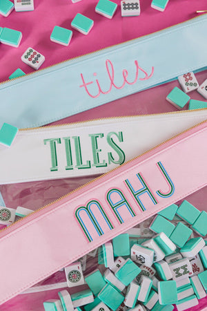 Stacked Mahjong nylon clear pouches in pastel colors personalized gaming accessories.