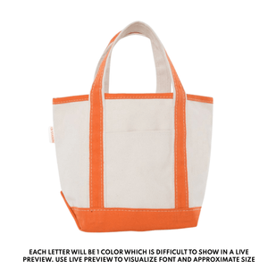 Durable orange-trim canvas tote bag, custom embroidered for teachers and everyday use.