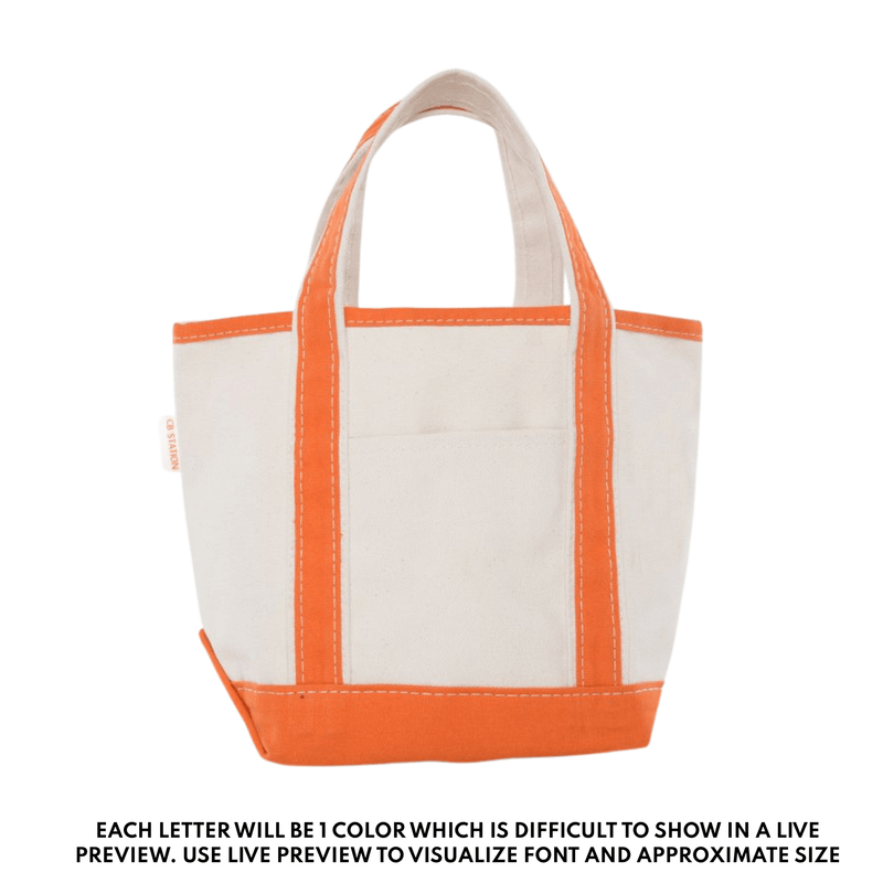 Durable orange-trim canvas tote bag, custom embroidered for teachers and everyday use.