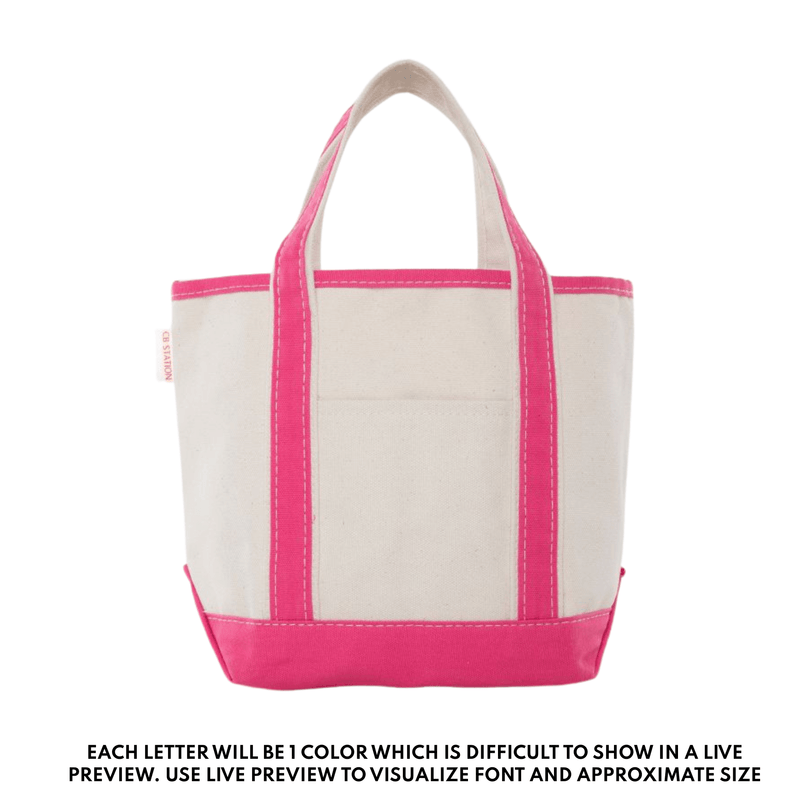 Personalized pink trim canvas tote bag with embroidered name, designed for teachers.