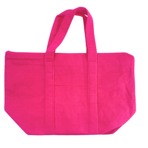 Pink terry tote bag with custom embroidery, fun and practical travel accessory.