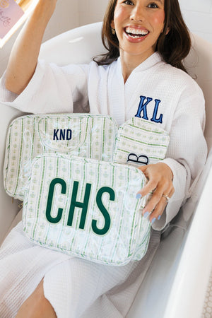 White robe with embroidered initials in applique design, cozy personalized gift.