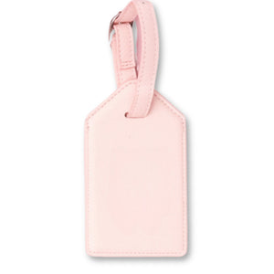 Blush pink leather luggage tag with gold foil monogram detail, ideal for stylish personalized travel.