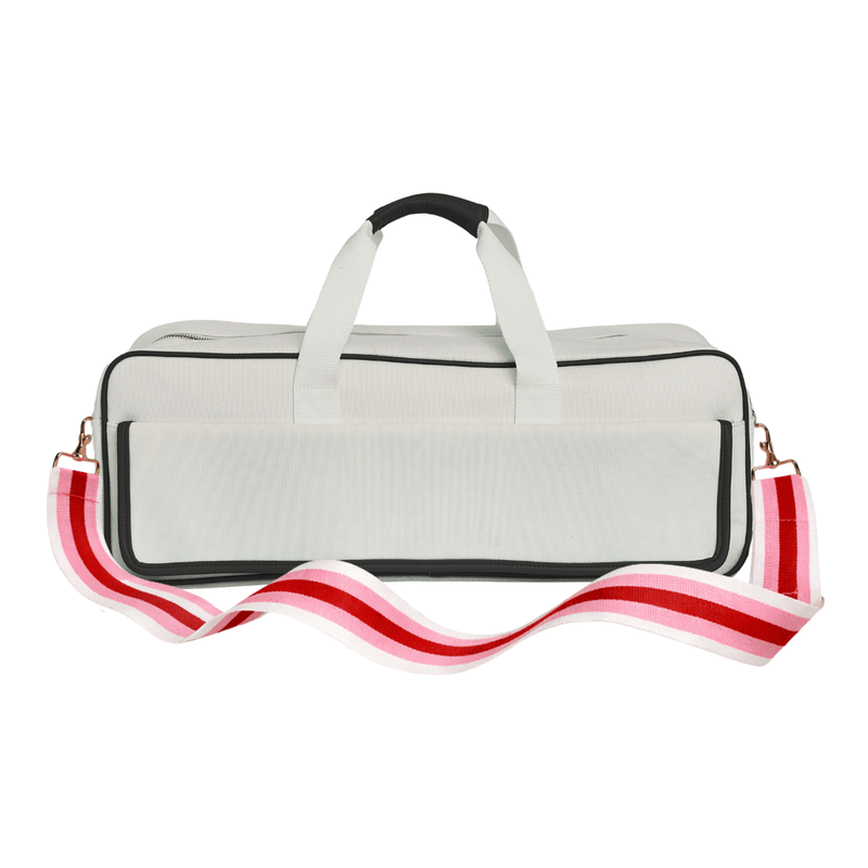 Blank white canvas mahjong carryall duffel with black trim and a pink and red striped strap, no monogram, on a white background