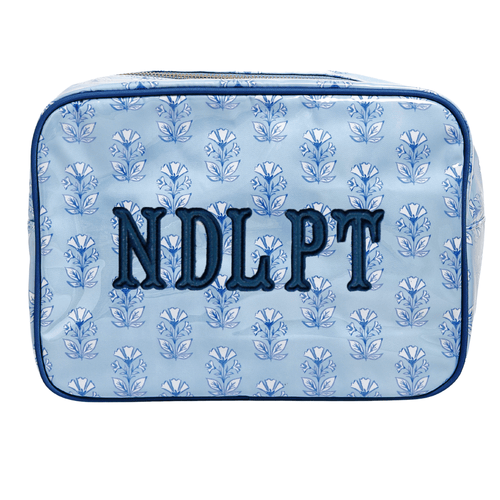Light blue floral XL project pouch monogrammed 'NDLPT' in navy, on a white background.