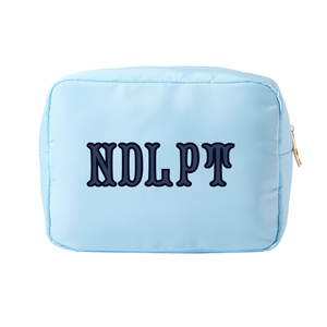 Light blue needlepoint XL project pouch with stitched design and durable zipper for organized storage.