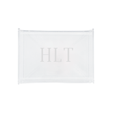 A sleek and modern personalized acrylic tray monogrammed with 'HLT,' perfect for stylish organization and display. This transparent, minimalist design seamlessly complements any home décor, making it an ideal gift or chic storage solution. Pair it with other customized accessories for a cohesive and elegant set.