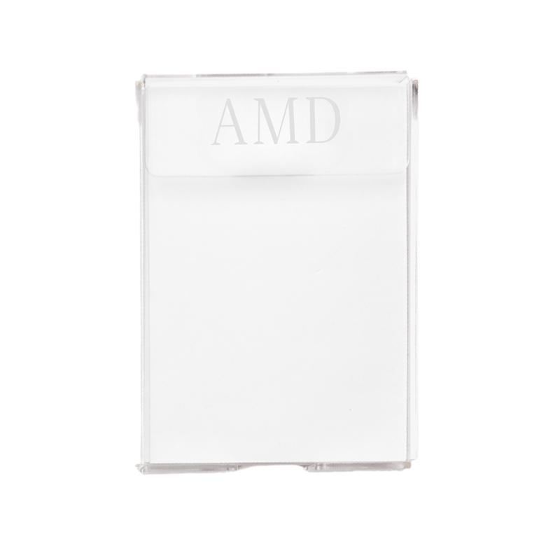 A stylish and functional personalized acrylic notepad holder monogrammed with 'AMD,' designed for a sleek and organized workspace. The clear, modern design effortlessly blends with any office or home décor, making it a perfect gift or desk accessory. Pair it with other custom office essentials for a cohesive set.