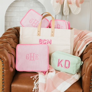 Personalized seersucker packing cube set with embroidered monograms, a travel essentials