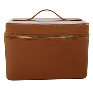 Brown leather train case with shadow monogram detail, designed for personalized travel storage.