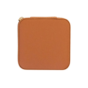 Tan travel jewelry case with shadow monogram, structured personalized storage.