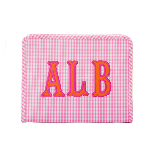 Pink gingham TRVL Roadie pouch with rounded corners appliqued 'ALB' in pink and orange, on a white background.