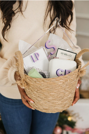 Clear acrylic notepad holder with personalized insert styled on a desk