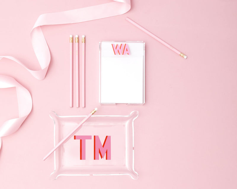 An acrylic tray and notepad are customized with initials