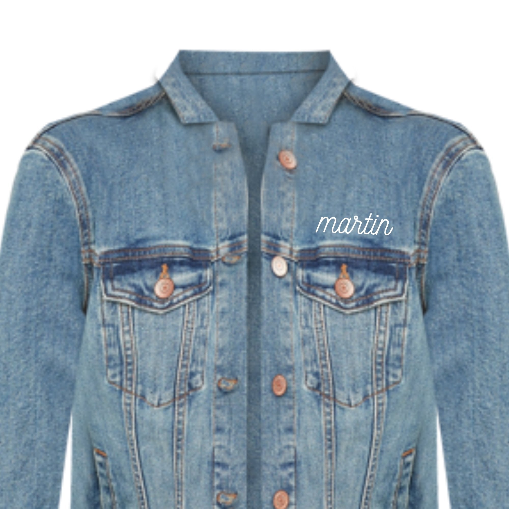 A denim jacket is customized above the pocket with a name in script white font.