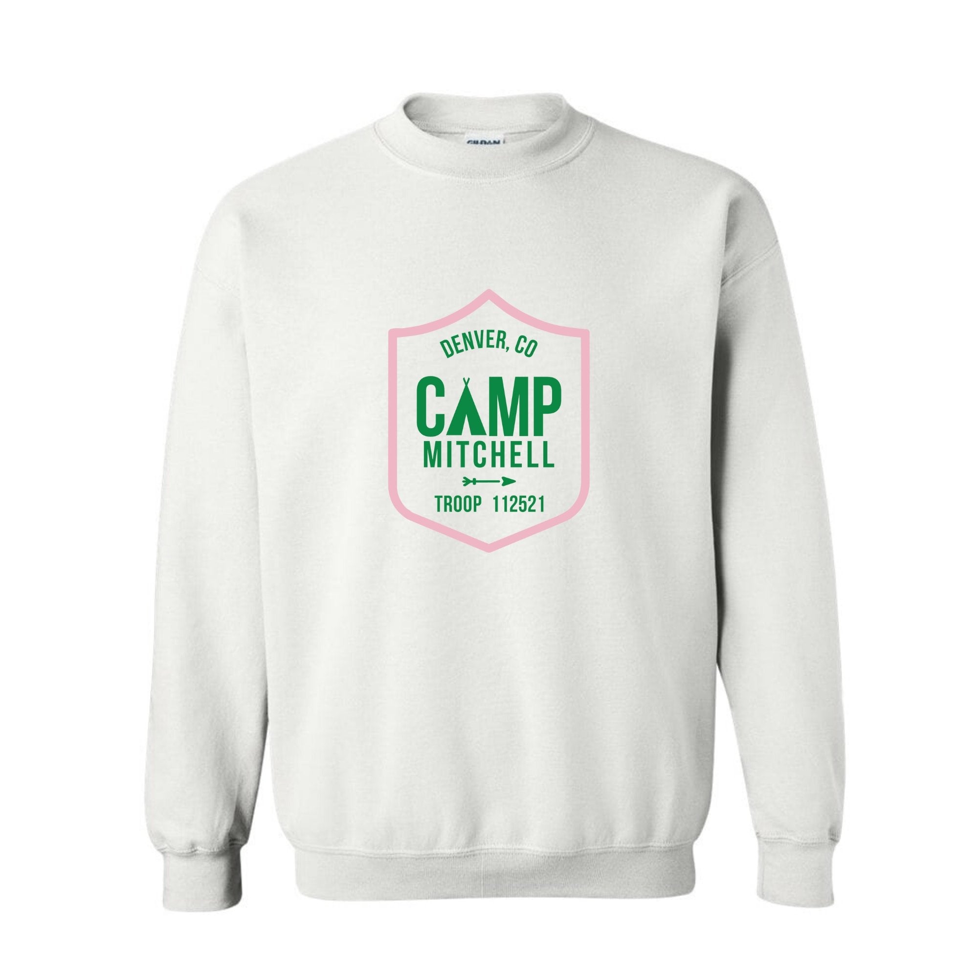 A white sweatshirt is customized with a green and pink camp logo