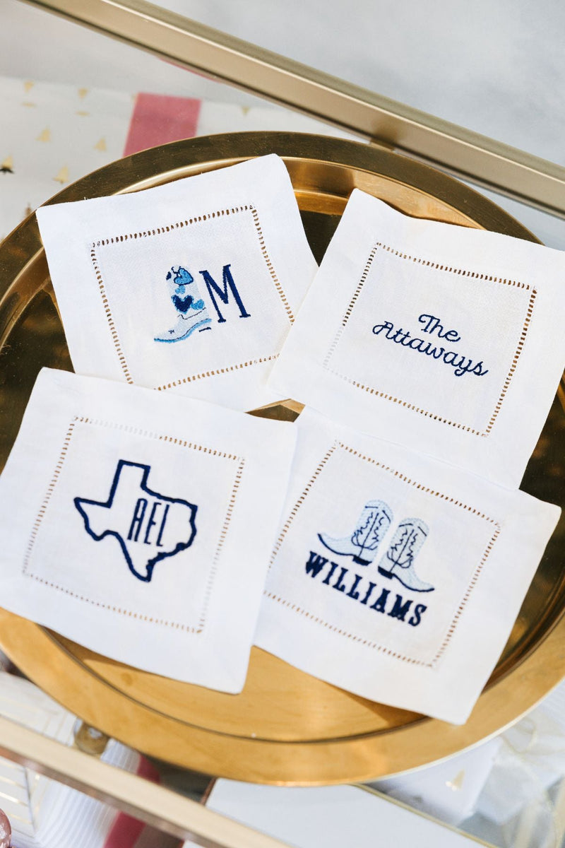A set of 4 custom embroidered cocktail napkins