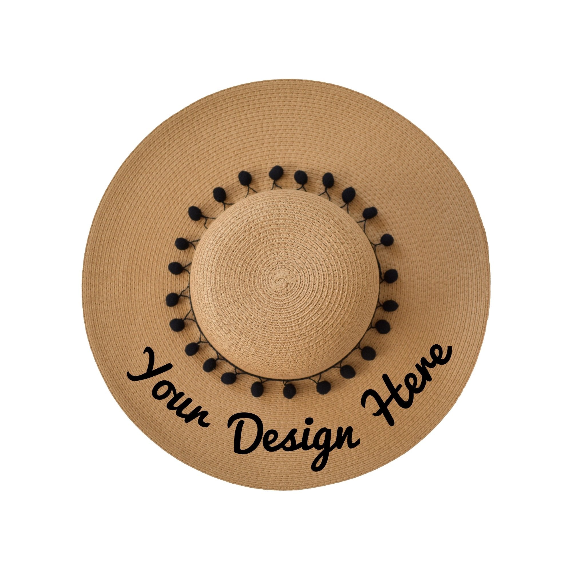 A floppy beach hat with black pompoms that can be customized