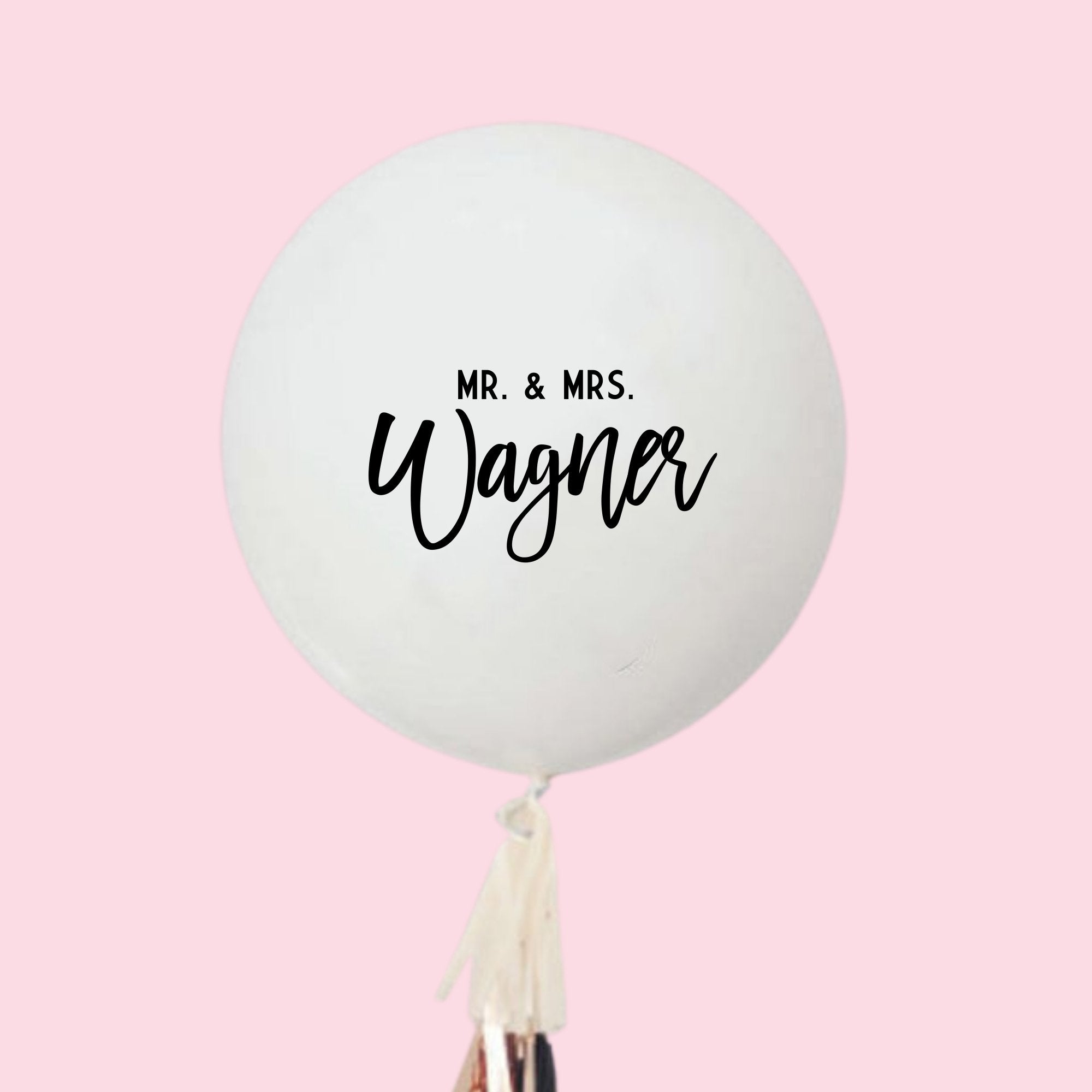 A white jumbo balloon reads "Mr. & Mrs. Wagner"