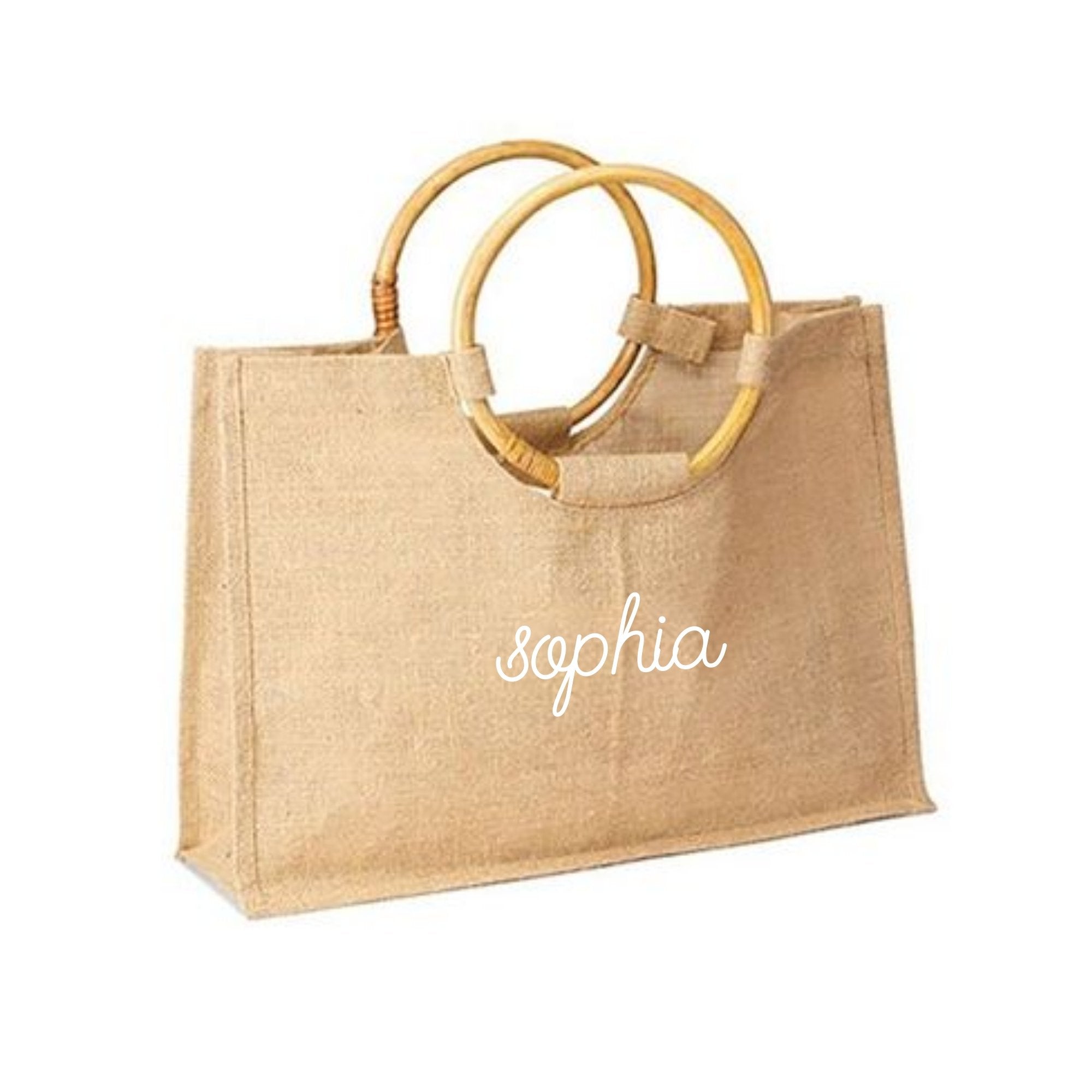 A bamboo jute is customized with a name in cursive white font
