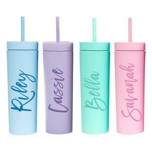 Four matte tumblers in blue, green, pink, and purple customized with a cursive font