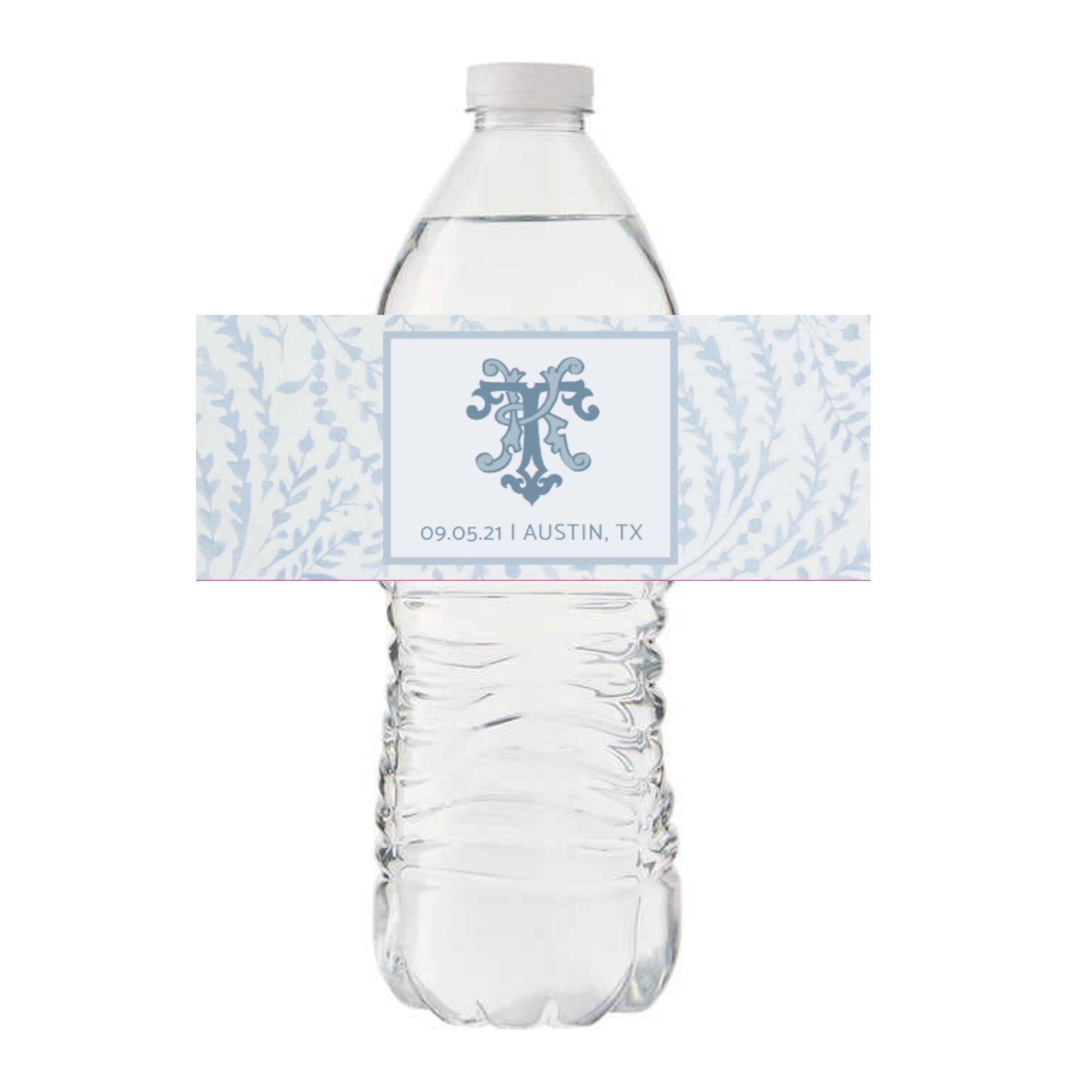 A water bottle is wrapped in a custom label with a monogram and a date
