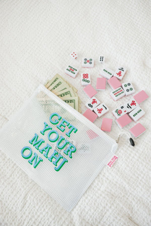 Our Get Your Mahj On pool bag filled with tiles and cash