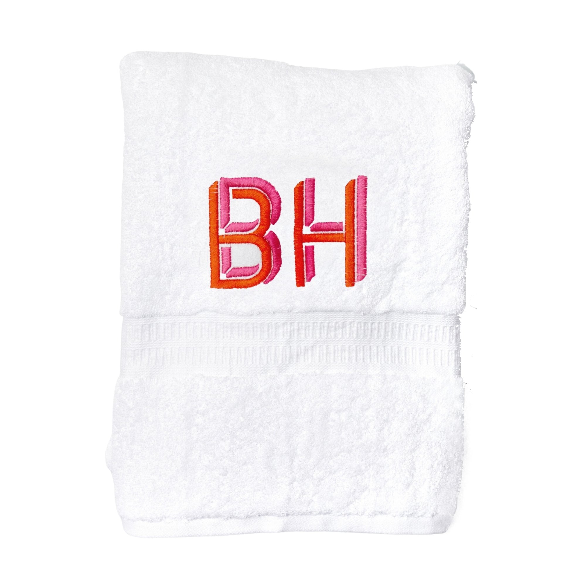 A white guest towel with "BH" embroidered in pink and orange