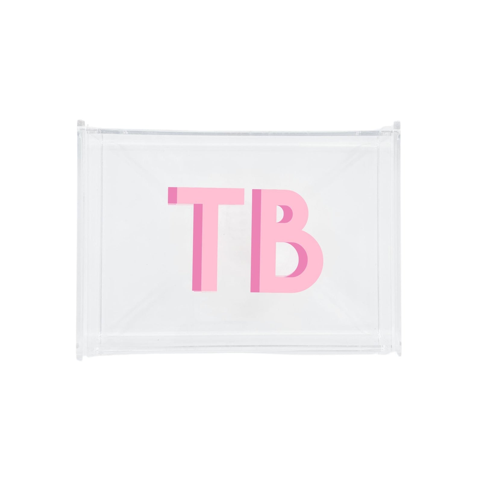An acrylic catchall box is customized with a pink monogram.