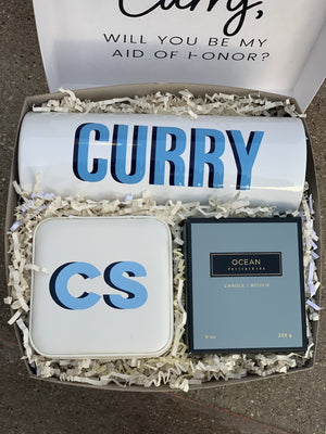 A bridesmaid proposal box filled with personalized goodies