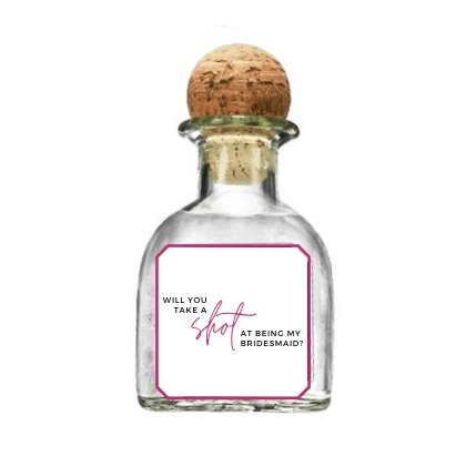 A tequila bottle is customized with a personalized label which says "Will You Take A Shot At Being My Bridesmaid?"