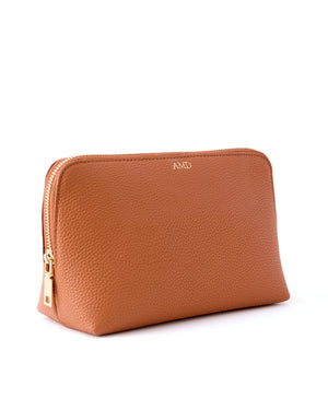 A tan leather pouch is customized with a gold foil monogram.