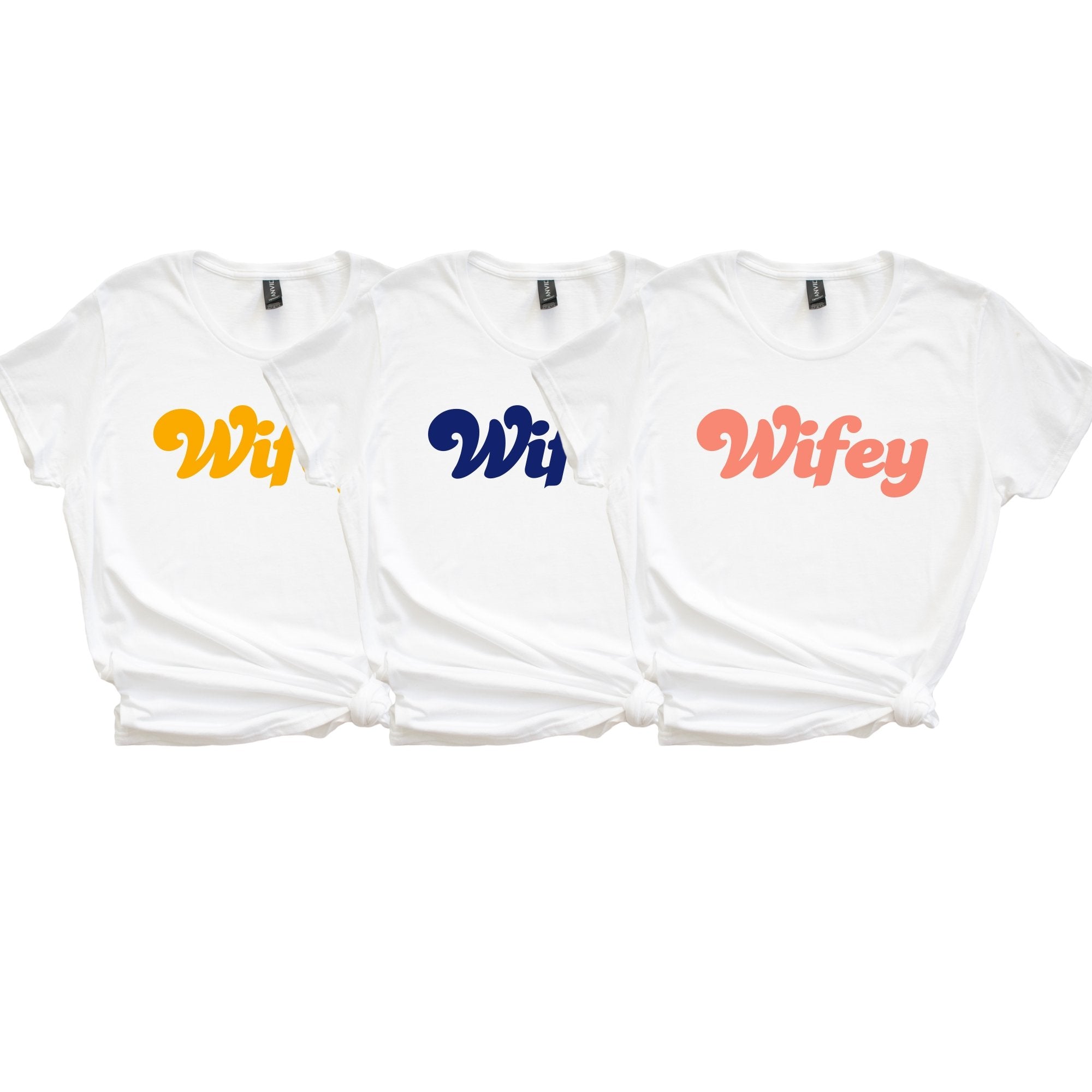 A white shirt is customized with "Wifey" in black.
