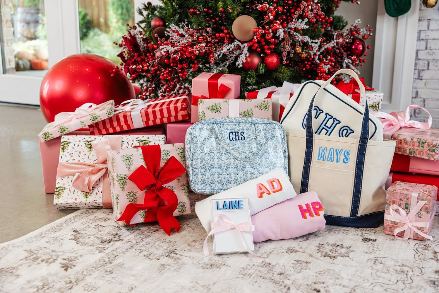 A Pile Of Christmas Gifts For Sisters And Sister In Laws Under A Christmas Tree