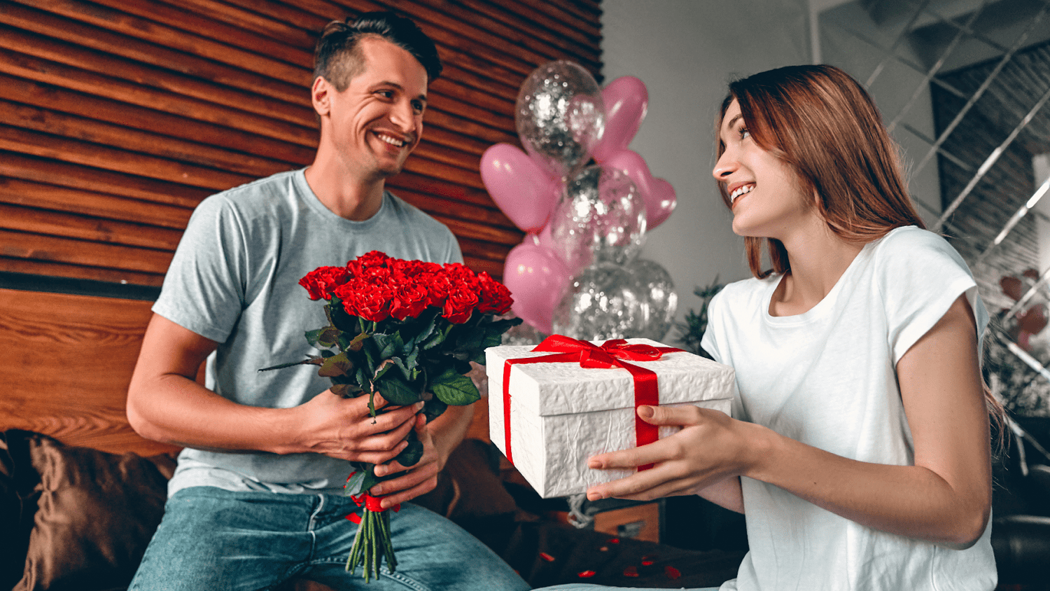 Husband Giving Gifts To His Wife