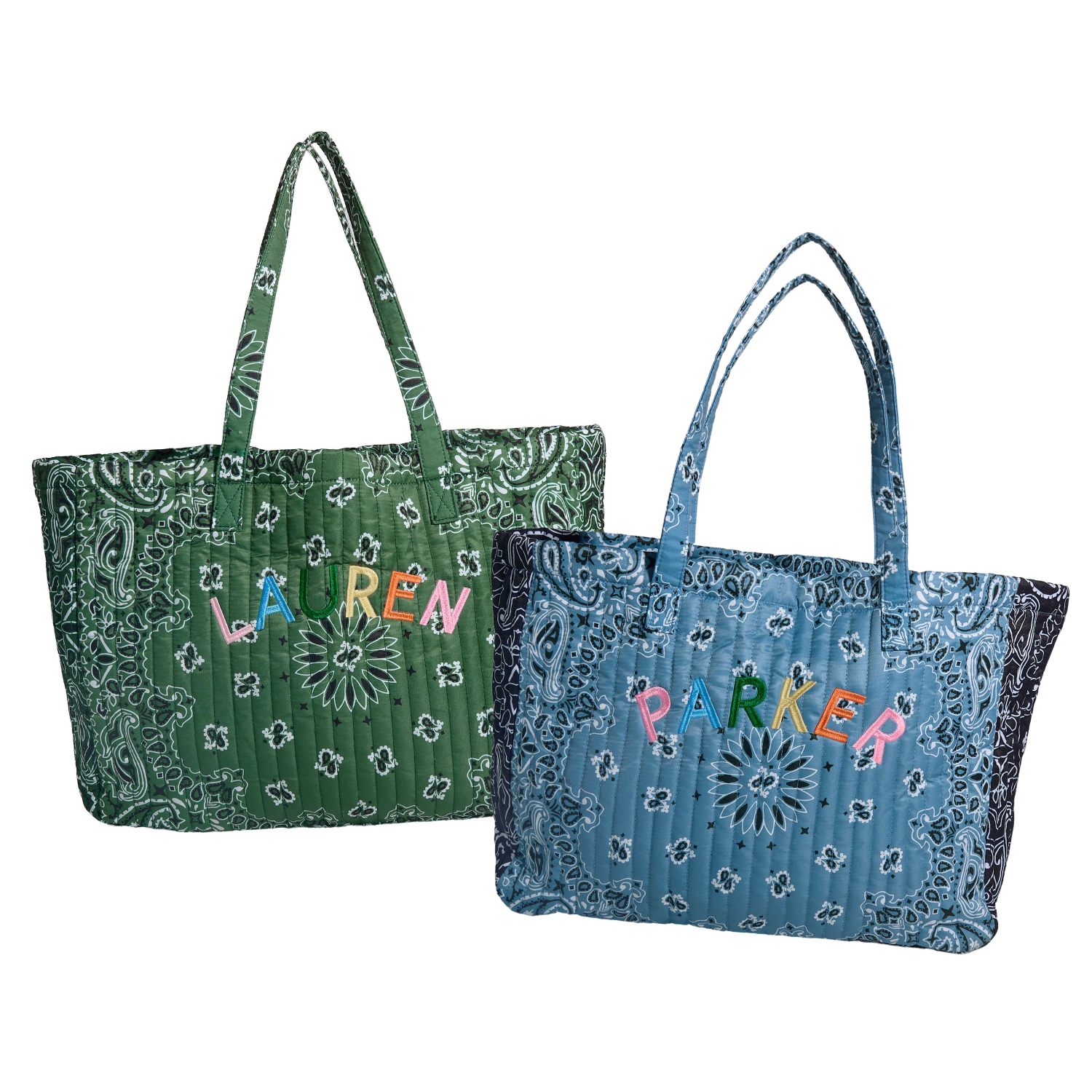 A quilted blue bandana tote bag with black paisley borders, featuring the word 'PARKER' embroidered in colorful letters across the front.